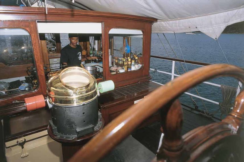 Cook preparing food onboard Sea Shell Liveaboard