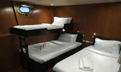 Deluxe Triple (Cabins 10, 11, & 12)