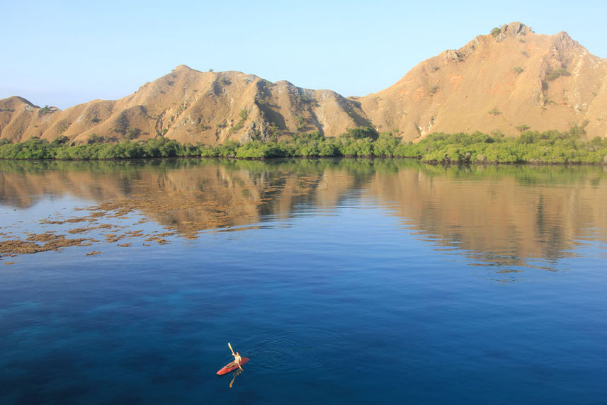 Kayaking on crystal clear waters in Komodo 