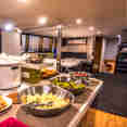 Breakfast in the dining area onboard ScubaPro II