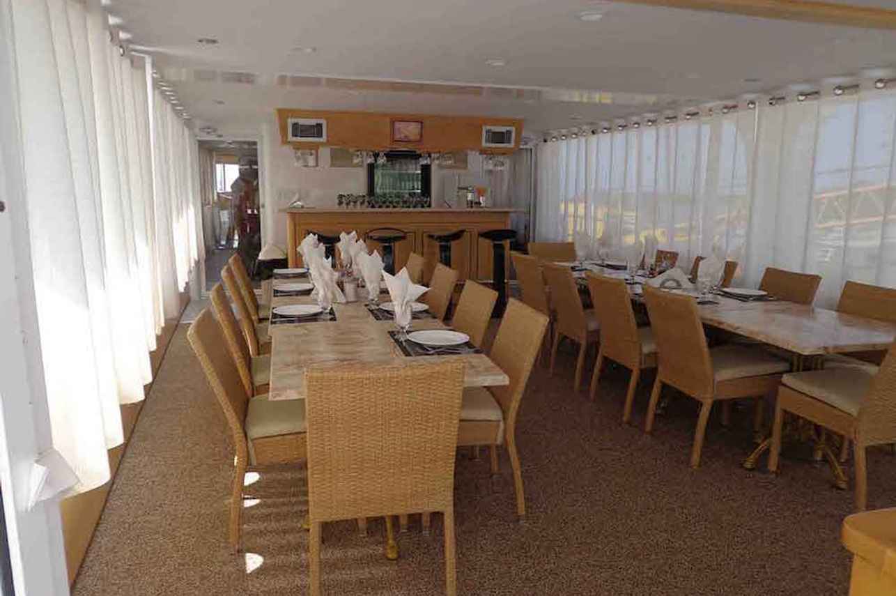 Spacious indoor dining area - Avalon II Liveaboard