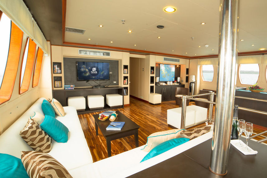 Comfortable indoor lounge and bar area - Majestic Galapagos Yacht