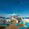 Sun deck with comfortable loungers - Majestic Galapagos Yacht