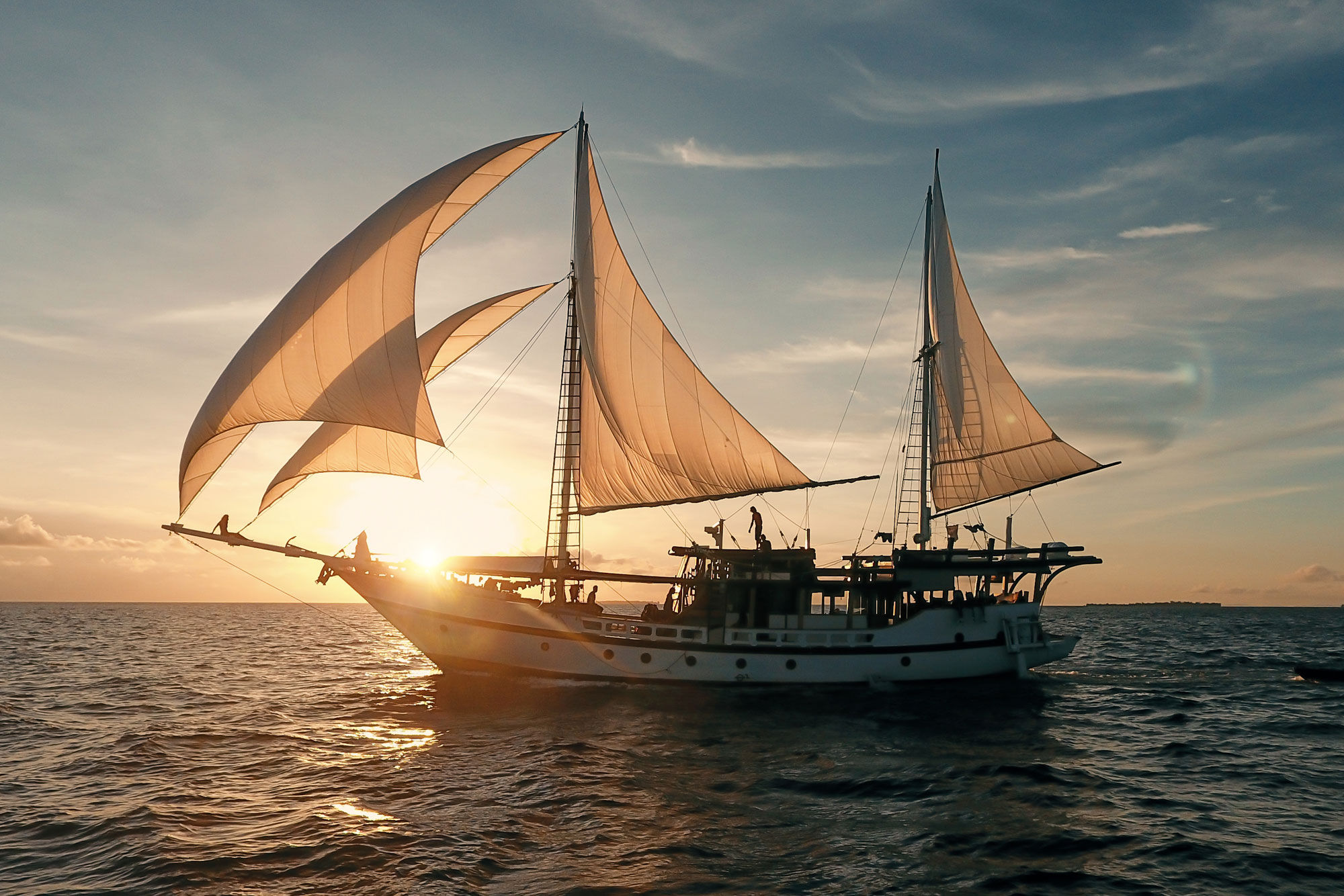 Teman Sailing in the Sunset