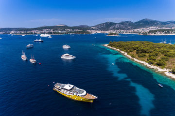 A cruise ship laying at anchor off a Croatian island