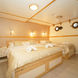 A cabin with double bed and single bed